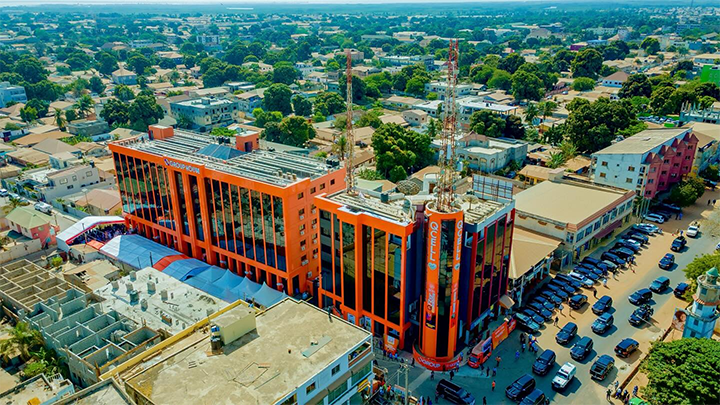Modern exterior of QGroup House on Kairaba Avenue